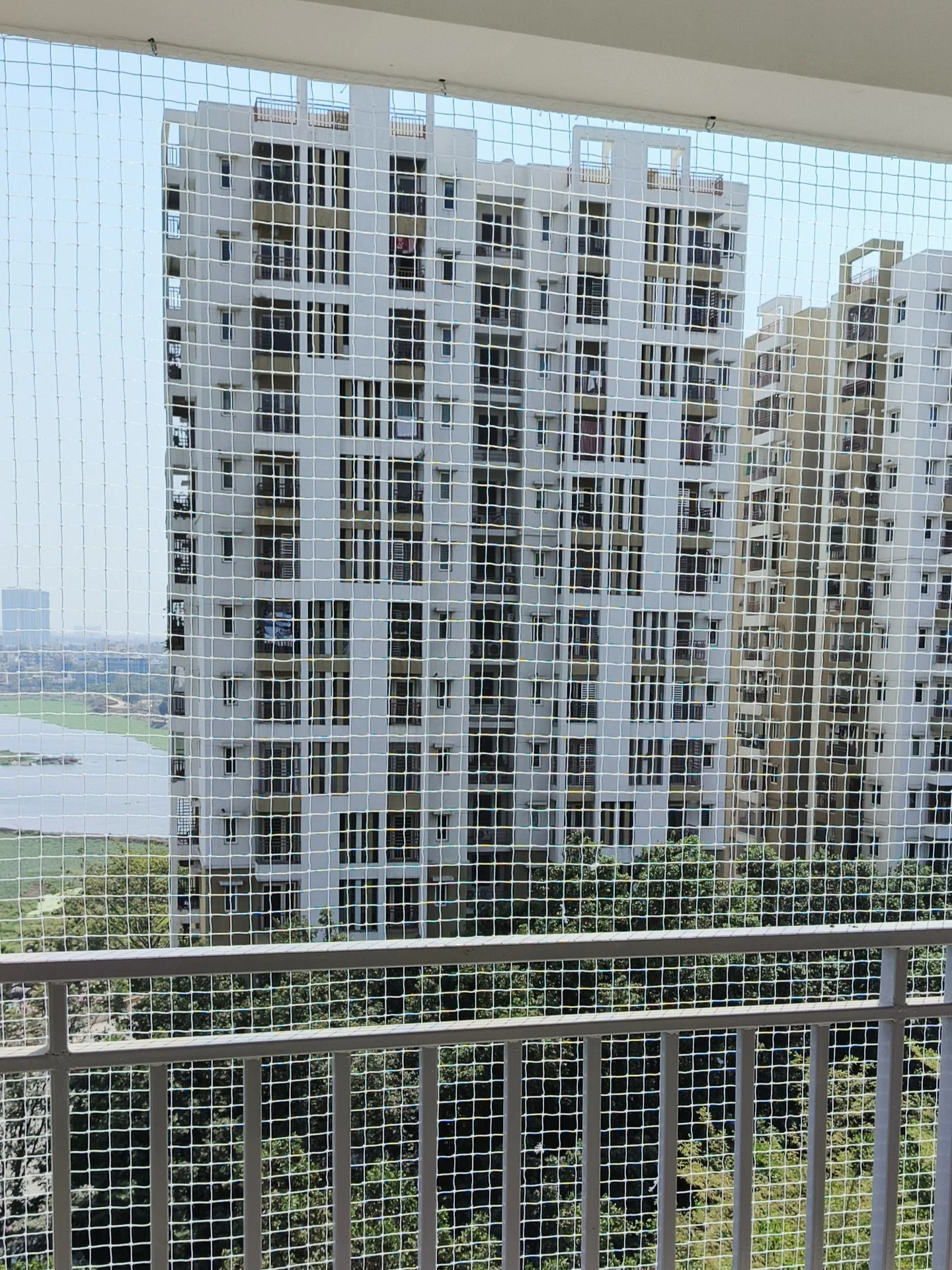 Safety net fitted across an apartment balcony