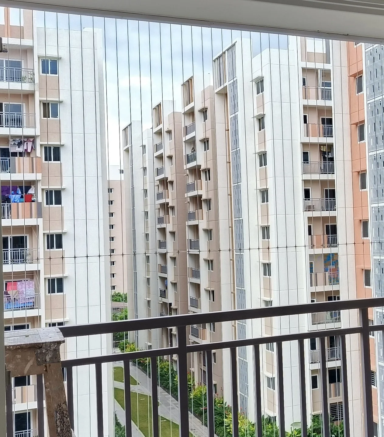Slim vertical invisible grills installed on a balcony